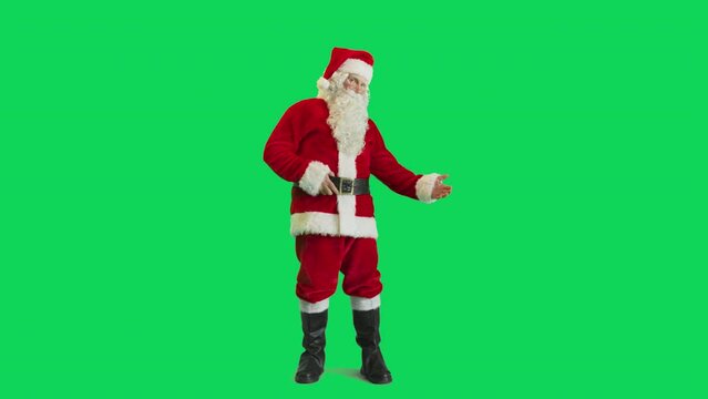 Studio Shot Isolated Mockup Template: Jolly Santa Claus Standing On Green Screen Chromakey Background And Inviting Guests To Magical Workshop On Christmas Or New Year's Holiday Celebration Slow Motion