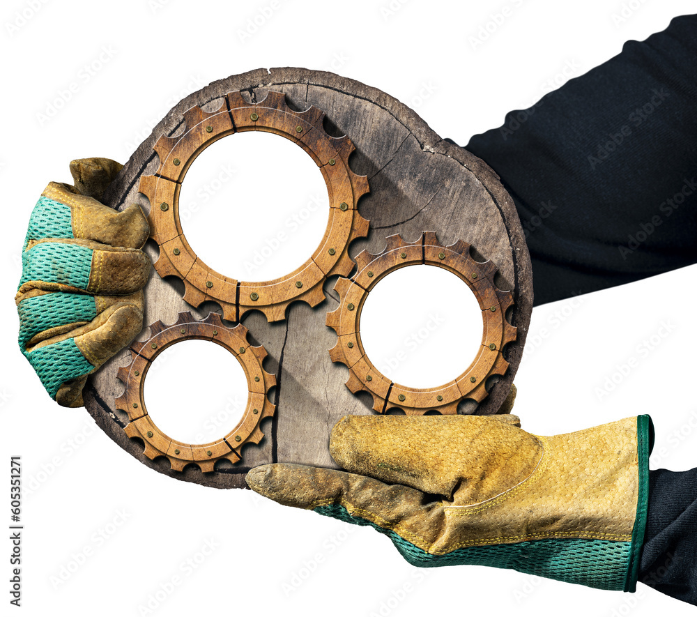 Poster hands with protective work gloves holding a cross section of a tree trunk with three wooden gears wi