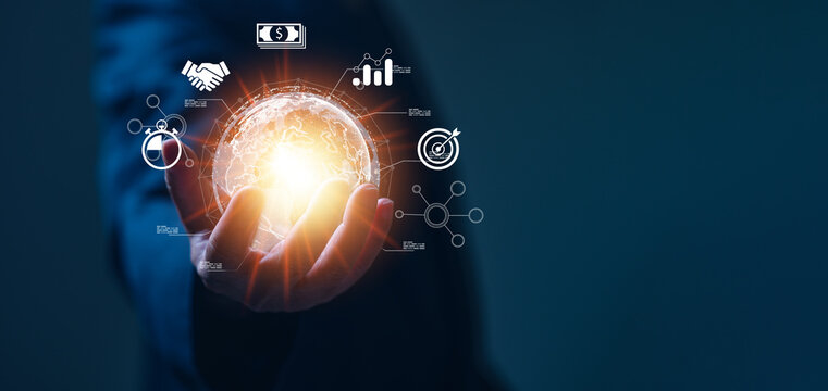 Businessperson confidently holds globe, influence harness power of electronic, symbolizing global reach, cloud computing technologies to manage large amounts of information, drive worldwide enterprise
