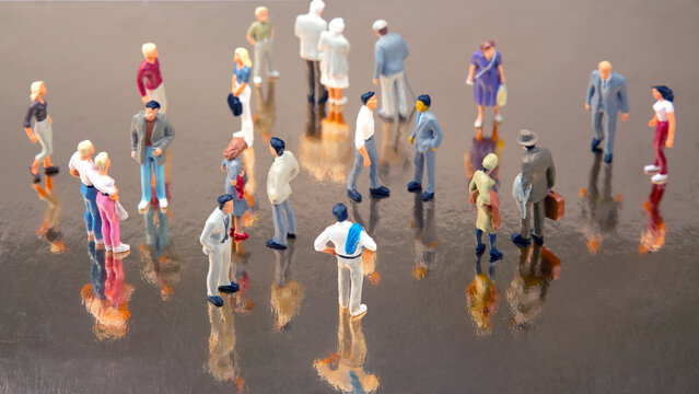miniature people. different people communicate with each other. communication of society of different generations