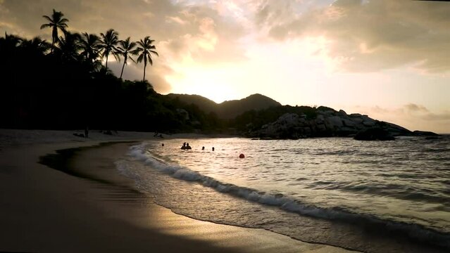 Sunset on a beautiful tropical beach in Colombia, Cabo San Juan, Tayrona National Natural Park, Magdalena, Colombia.