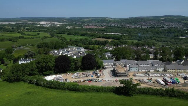 Newton Abbot, South Devon, England: DRONE AERIAL VIEWS: A construction site for new build houses on green belt land in the TQ12 postcode area (Clip 2)