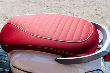 gorgeous red leather motorcycle seat with white stitching
