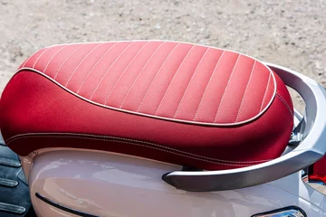 Foto op Canvas gorgeous red leather motorcycle seat with white stitching © Андрей Знаменский