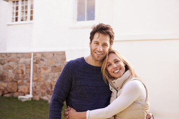 Fototapeta premium New home, outdoor portrait and happy couple hug for house, real estate and property purchase, sale or investment. Mortgage, happiness and smiling woman, man or homeowner people embrace for relocation
