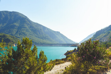 Scenic seascape view of a sea bay surrounded with mountains. Peaceful landscape picture of coastline taken from the mountain top