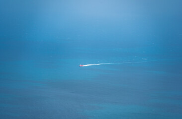 view of Ben Dam Port in Con Dao island, Vietnam with beautiful blue sea, blue sky mountain and...