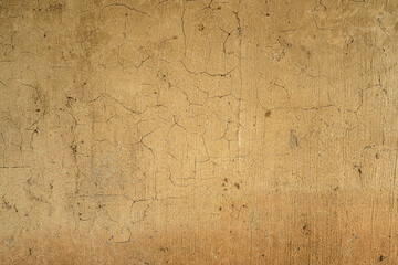Soil wall texture of old clay house structure. Mud background. Soft picture, vintage tone.