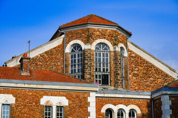 Former prison of the city center of Meaux in the French department of Seine et Marne near Paris - Old stone jail with barred windows and a large nave