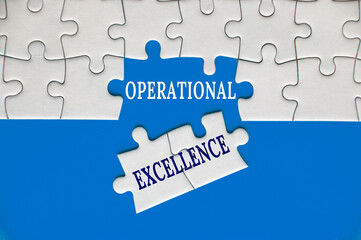 Operational Excellence text on missing jigsaw puzzle with blue cover background. Operational excellence concept