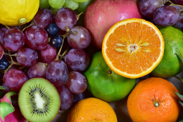 Naklejka na ściany i meble assorted fruits, top view healthy food concept Including high vitamin fruits, fresh fruits, tropical fruits