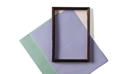 Black Wooden frame over paper background, the concept of minimalism