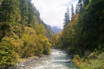 Panoramic view on the way to Har Ki Dun. you see Swagarohini Peak in the center of picture and many huts in bottom.