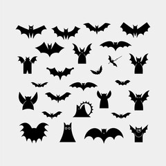 Black silhouettes of bats set isolated on white background