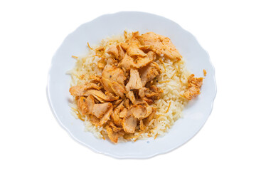 Turkish and Arabic Traditional Ramadan chicken doner kebab with tasty tomato sauce and rice or turkish pilav in white plate on wood table background. Pilav ustu tavuk doner. High quality photo