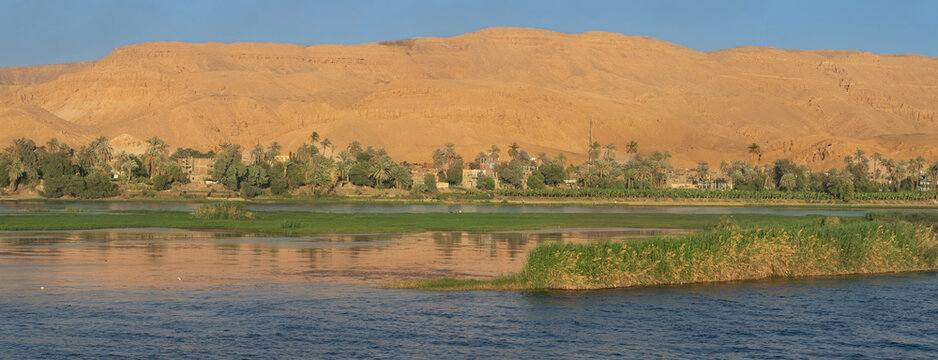 Desert, mountains in the riverbank of the Nile - Powered by Adobe
