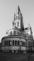 View of the Christian Cathedral of the 19th century in the Irish city of Cork. Christian religious architecture in the Neo-Gothic style. Cathedral Church of St Fin Barre. Black and white.
