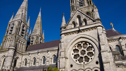 Fototapeta na wymiar The Cathedral of the Anglican Church in Cork. Cathedral of the 19th century in the Neo-Gothic style. Cathedral Church of St Fin Barre, Cork - One of Ireland’s Iconic Buildings.