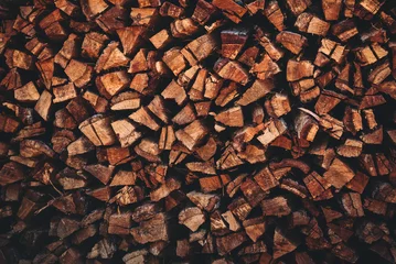 Foto op Plexiglas Pile of firewood texture abstract background © Platoo Studio