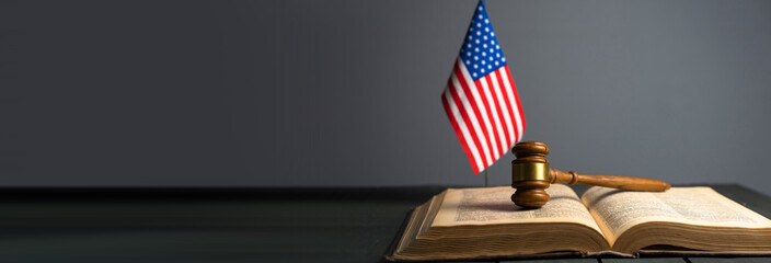 Judge's gavel on book and flag of america