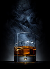 Whiskey with ice and smoke