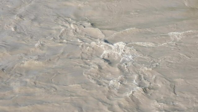 Close-up of a turbulent stream of a mountain river.
