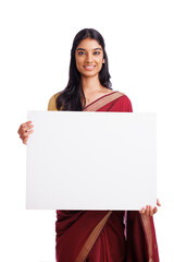 Happy Indian woman in traditional saree holding sign board isolated on white. advertisement concept. 