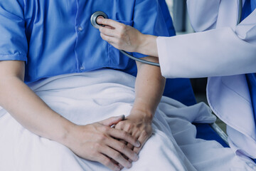 Male patient having consultation with doctor or psychiatrist who working on diagnostic examination...