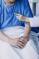 Male patient having consultation with doctor or psychiatrist who working on diagnostic examination on men's health disease or mental illness in medical clinic or hospital mental health service center
