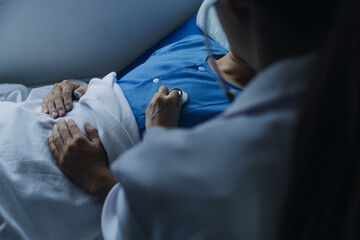 Male patient having consultation with doctor or psychiatrist who working on diagnostic examination on men's health disease or mental illness in medical clinic or hospital mental health service center