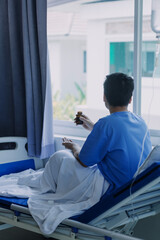 Caucasian doctor, nurse or scientist diagnosis patient symptom on bed for analysis the drug, medicine, vaccination and preparing for injection to patient in hospital. Covid19 medicine and drug concept