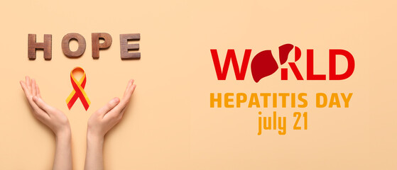 Hands with awareness ribbon and word HOPE on beige background. World Hepatitis Day