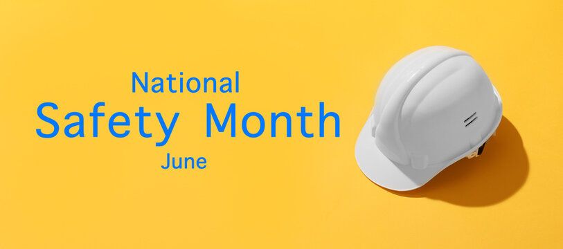 Banner for National Safety Month with hardhat