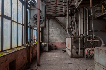 Fototapeta na wymiar Forgotten Forge: Unveiling Poland's Hidden Military Boiler Room in the Heart of the Forest