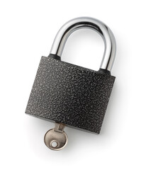 Top view of steel padlock with inserted key