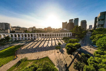 Aerial View of Lapa Aqueduct With City Downtown in Rio de Janeiro on Sunset