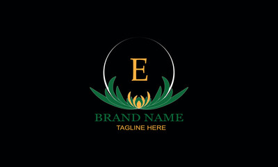 Floral logo design with elegant letter E. Monogram elements for women's beauty salon, massage, cosmetics or spa brand, business.