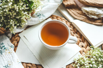 Cup of hot tea and spring home interior. good morning concept