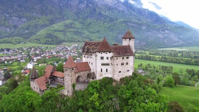 beautiful medieval castles of Europe - impressive Gutenberg in Liechtenstein, border with Switzerland, surrounded by Alps mountains, aerial view
