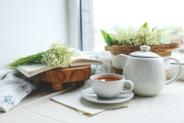 Cup of hot tea and spring home interior. good morning concept
