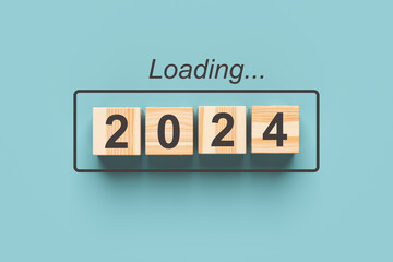 2024 new year loading. Wooden cubes with 2024 on a blue background. 3d rendering.