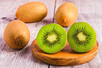 Exotic taste: fresh kiwi on a cutting board