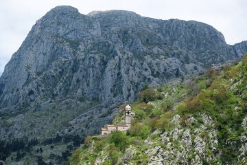 Fototapeta na wymiar Church on fortress wall in Kotor, Montenegro. Montenegro. Kotor is a beautiful historic city on the Unesco list.