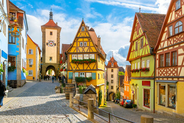 A sunny day at the picturesque village of Rothenburg ob der Tauber, Germany, the most famous stop...