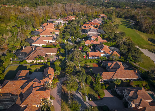 Aerial view of row of ultra luxury homes on the golf course in Lake Mary, Orlando, Florida.