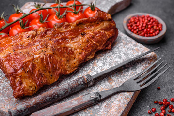 Delicious grilled or smoked pork ribs with salt, spices and herbs