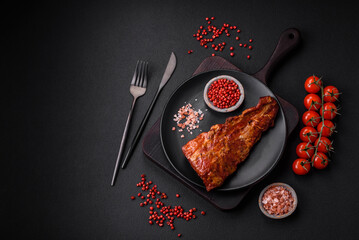 Delicious grilled or smoked pork ribs with salt, spices and herbs