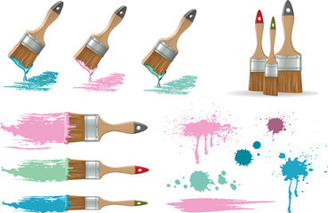 Isolated flat brushes with strokes and spots of paint 