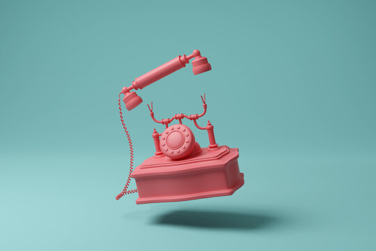 Vintage pink phone and receiver floating in mid air on green background. Illustration of the concept of minimalism, business phone calls, call centers and telecommunication