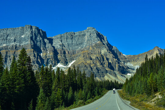 The CanAm highway winding among the spectacular rugged mountains of Banff national park in Alberta,Canada.
